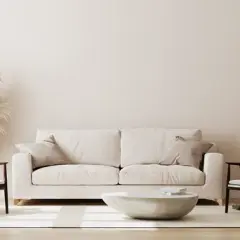 Jakie dodatki do beżowej kanapy, które odmienią Twój salon?